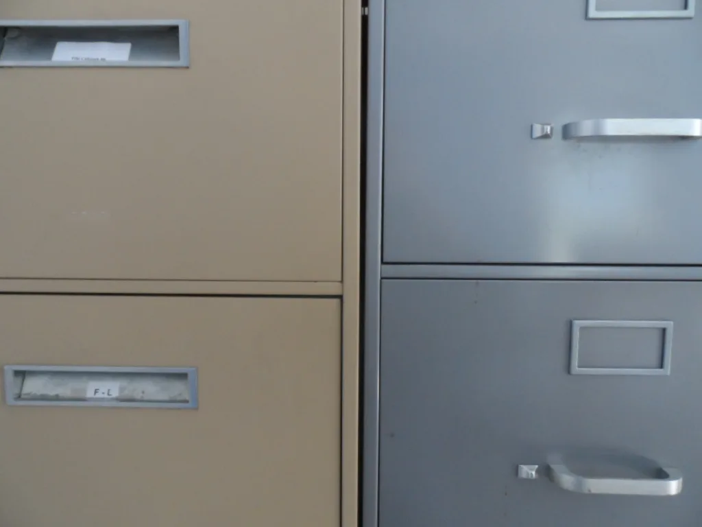 The drawer facings of office filing cabinets