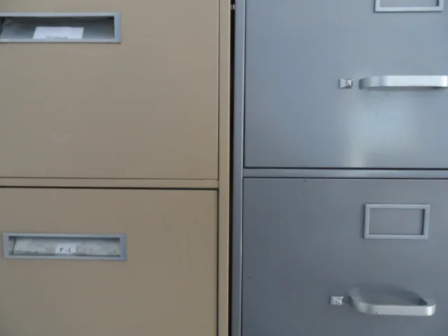 The drawer facings of office filing cabinets. Business insurance quality checklist for policy records